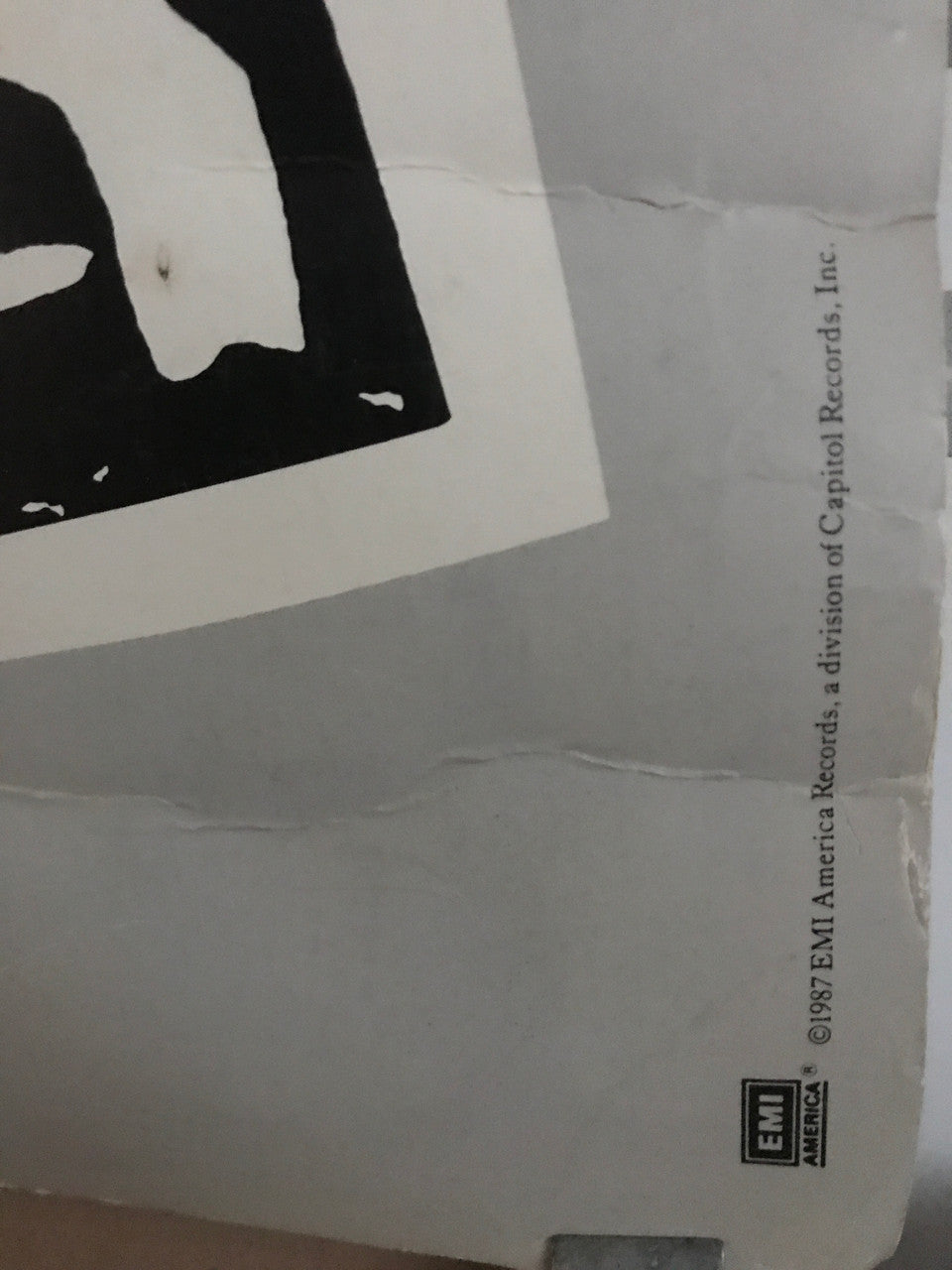 David Bowie, Never Let Me Down, promotional music poster published by EMI America Records, 1987 - HAPPIEST KID FINDS - Museum-quality antique and vintage posters, original art, preservation and restoration