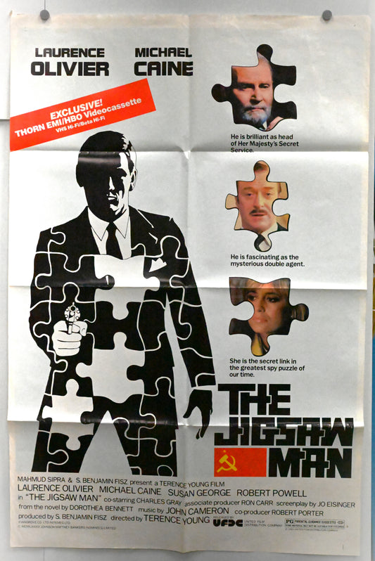Vintage movie poster for 'The Jigsaw Man' featuring a puzzle piece design with Laurence Olivier and Michael Caine.