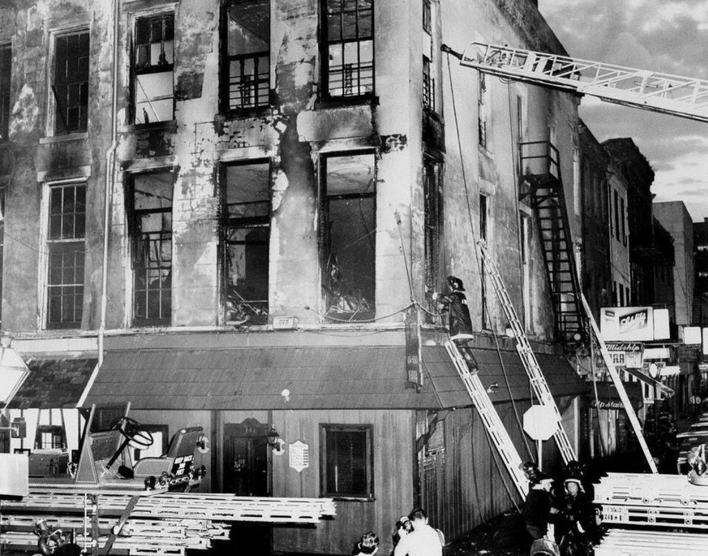 A firefighter examines the remains of the UpStairs Lounge on June 24, 1973, after a fire that left 32 dead.
New Orleans Times-Picayune via AP