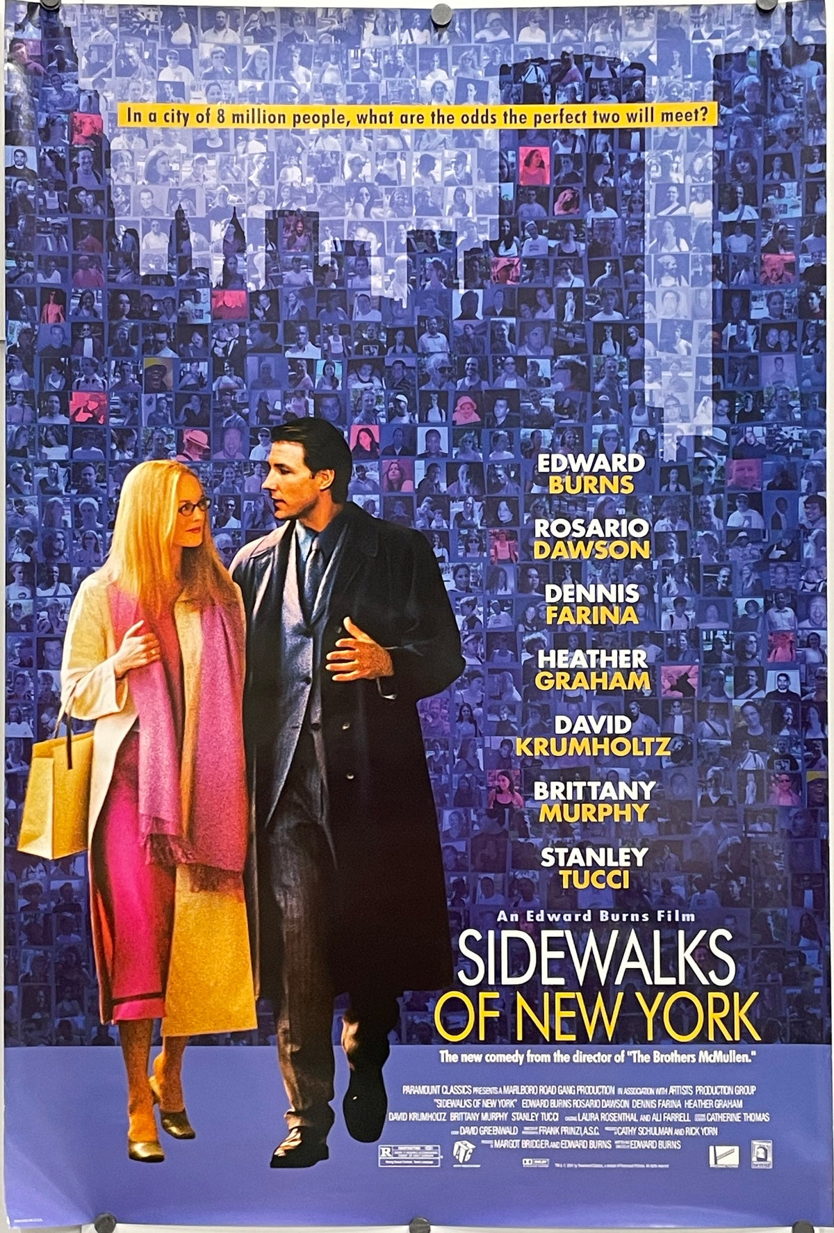 Sidewalks of New York,
original one-sided US one-sheet film poster, rolled. Image of couple walking together in front of a photo montage that makes up a blue gradient of the NYC skyline; there's a clear silhouette of the Twin Towers at the upper right side.