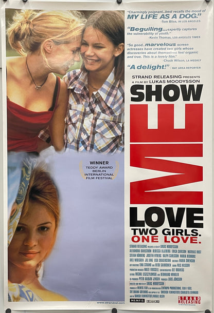 Show Me Love
used vintage, rolled original one-sheet film poster, featuring two people embracing with text about the film.