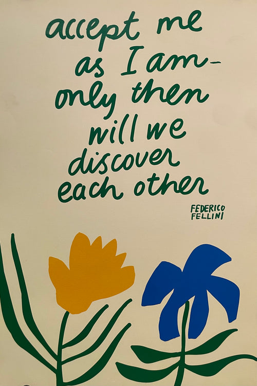 A vintage motivational poster featuring a quote by Federico Fellini with a graphic element of a flower and leaves in blue and yellow on a green background.