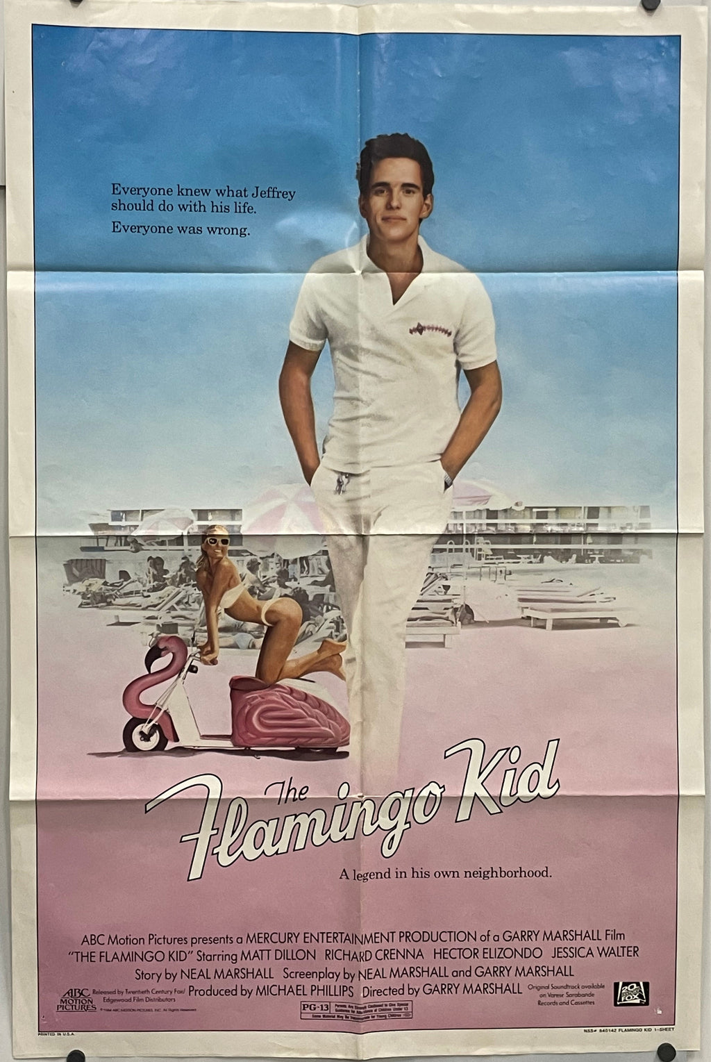 Vintage movie poster for 'The Flamingo Kid', US one-sheet film poster with a young boy and flamingo on a beach.