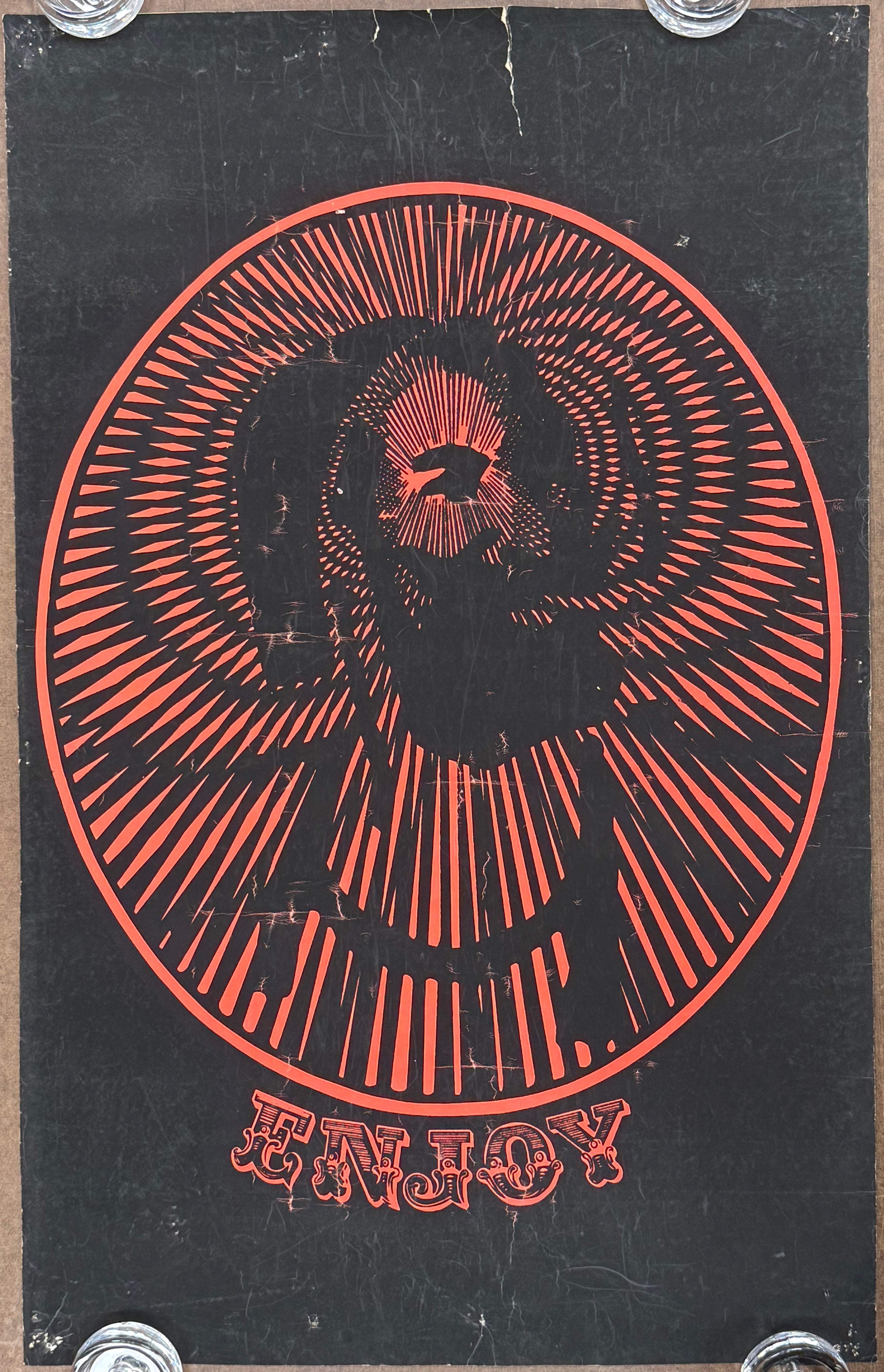 Black and red psychedelic graphic featuring The Zig-Zig man logo with the text ENJOY under the portrait. 