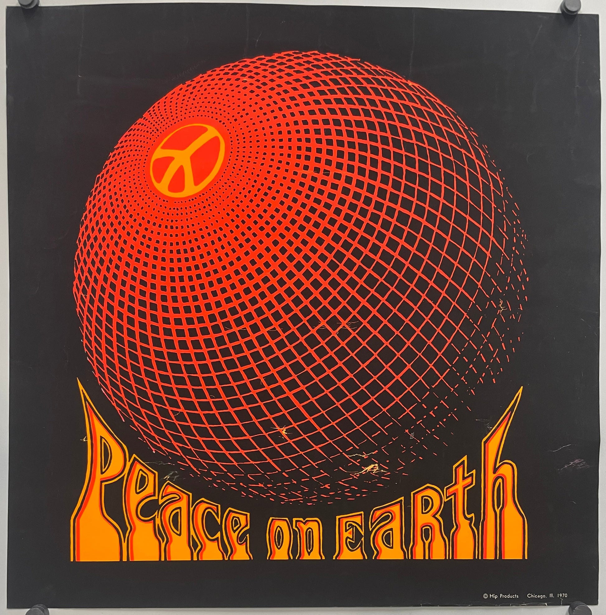 Rare and Vintage, Peace on Earth, screen printed black light poster, 1970 with orange sphere design and text on a black background.