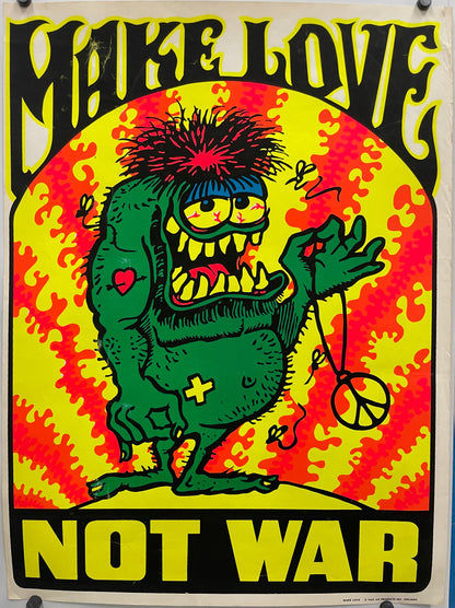 Make Love Not War&nbsp;
rare and vintage screen-printed black light poster. Colorful poster with a green creature on a red and yellow background.