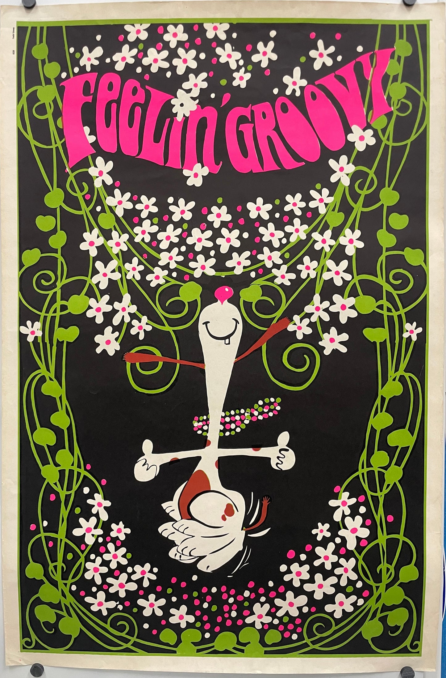 FEELIN' GROOVY ( title across the top) fun and lively vintage lithographic commercial poster. Image of a dancing Snoopy wearing a colorful beaded necklace, surrounded by flowers.