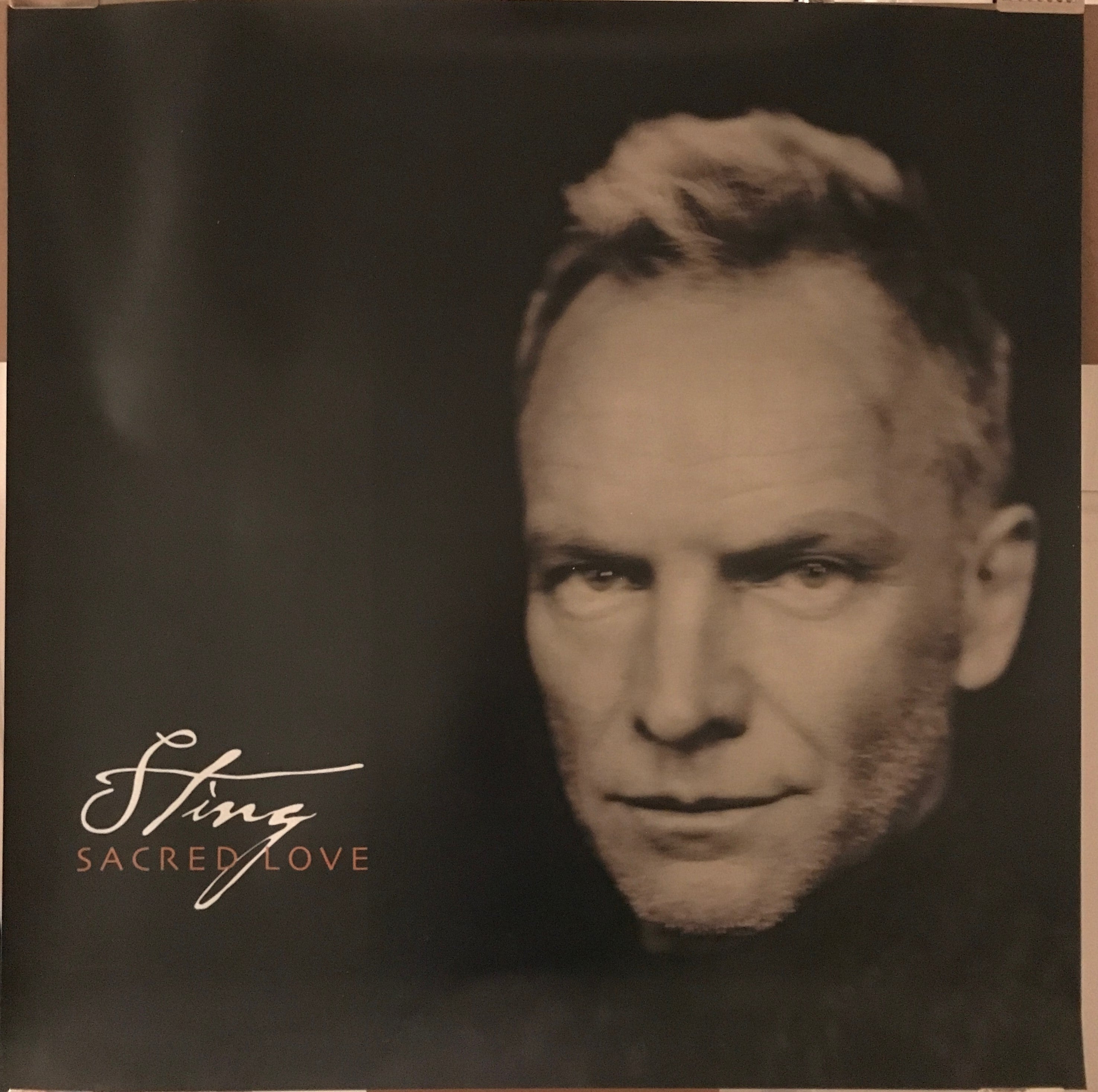 Sting - Sacred Love, smaller format on mylar promo music poster, 2003 - HAPPIEST KID FINDS - Museum-quality antique and vintage posters, original art, preservation and restoration