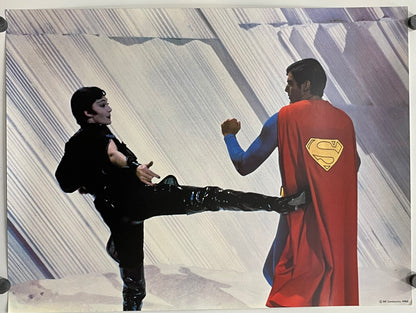 Superman in a red cape with a yellow 'S' emblem is kicking a person in a black outfit against a striped background.