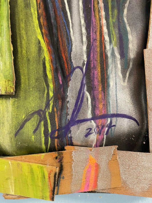 Abstract artwork with colorful brush strokes and a signature on a textured surface.