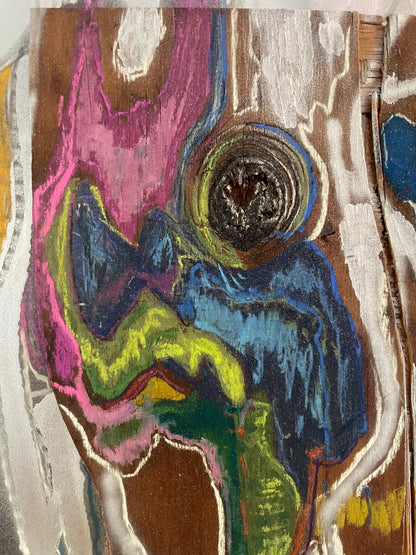 Abstract painting with swirling colors on a textured surface
