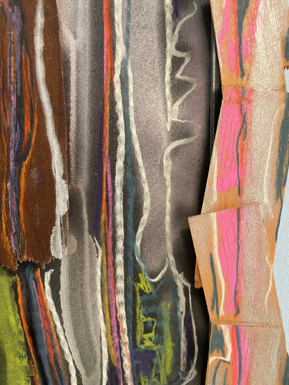 Close-up of a textured fabric with colorful patterns