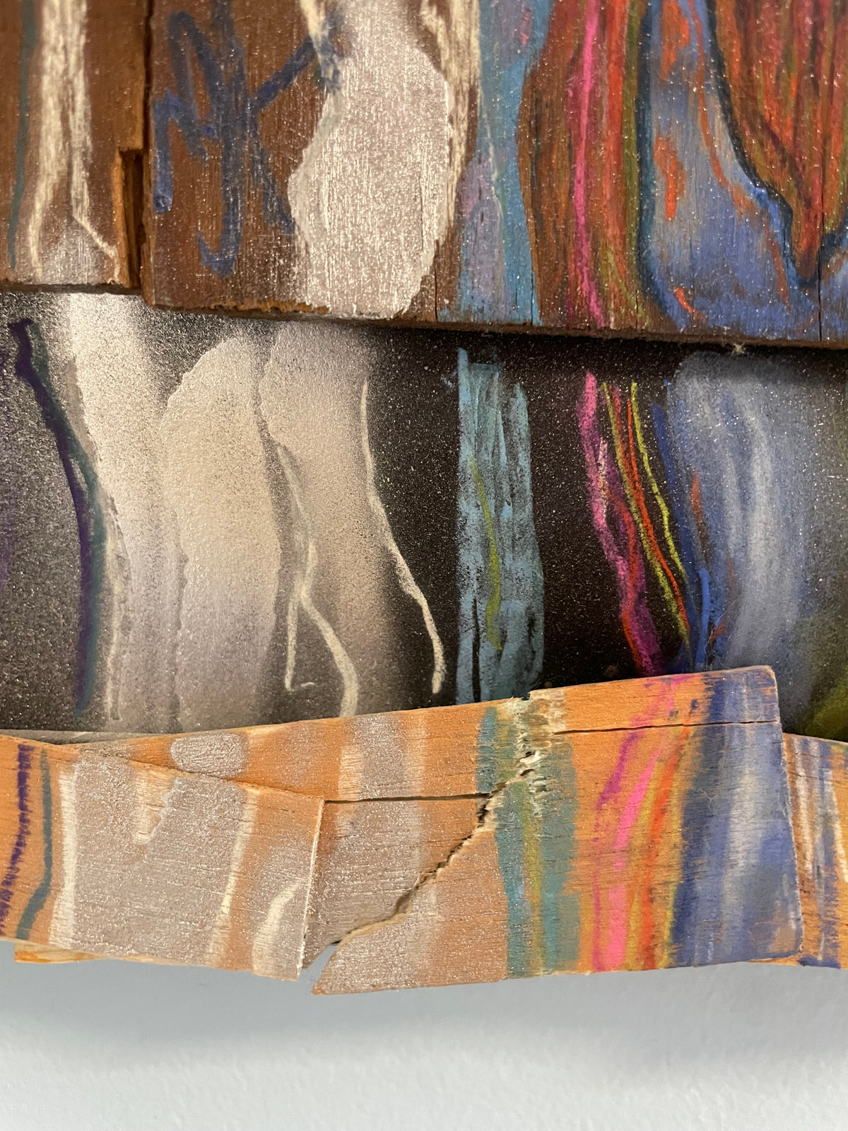 Close-up of a textured fabric with abstract patterns in earthy tones.