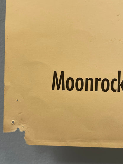 Cardboard box with 'Moonrock' branding on a gray background