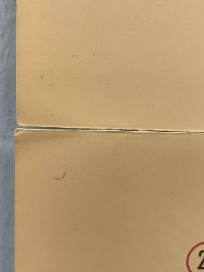 Close-up of a cardboard box corner with a visible seam.