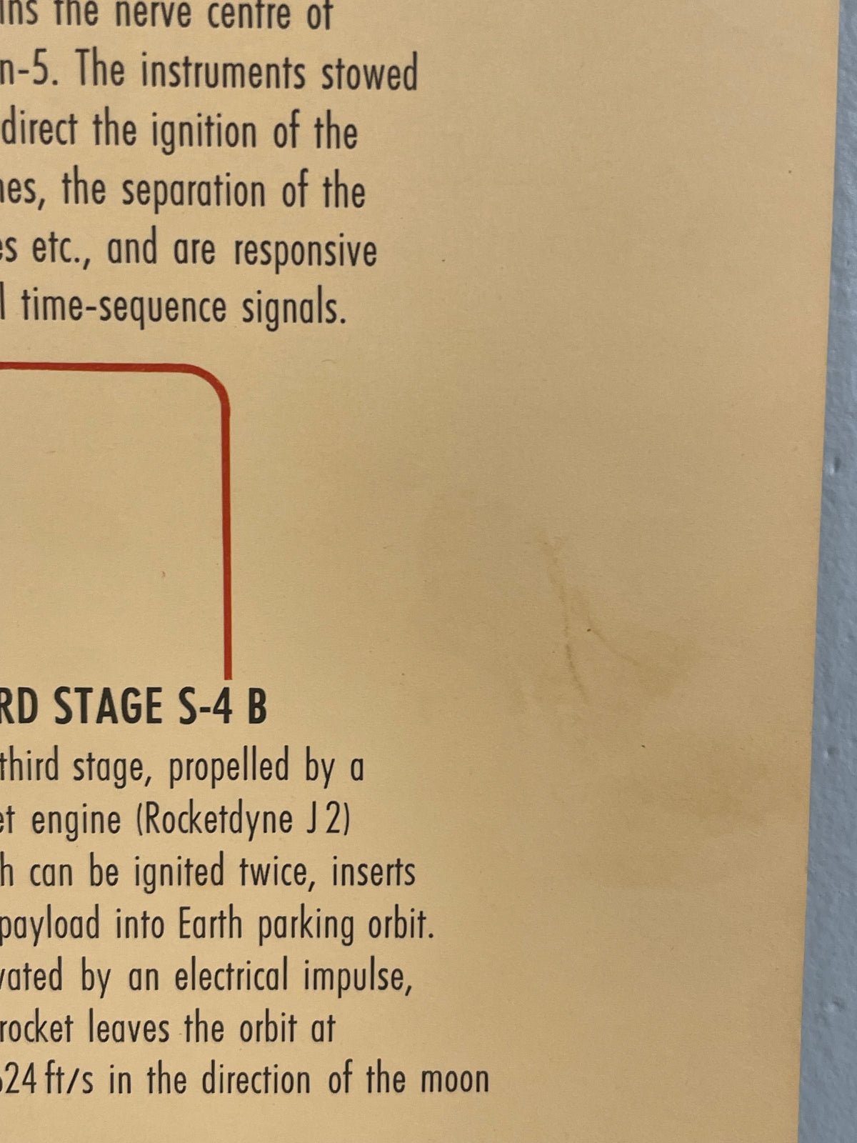 Text on a beige background with a blue border