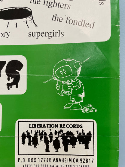 Green label with black and white illustrations and text, featuring a robot-like figure and 'Liberation Records' logo.