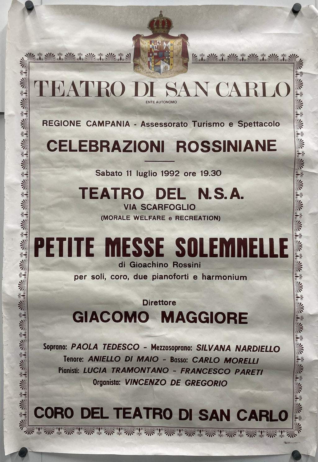 Vintage poster for a Rossini opera performance at Teatro San Carlo, featuring text and decorative elements.