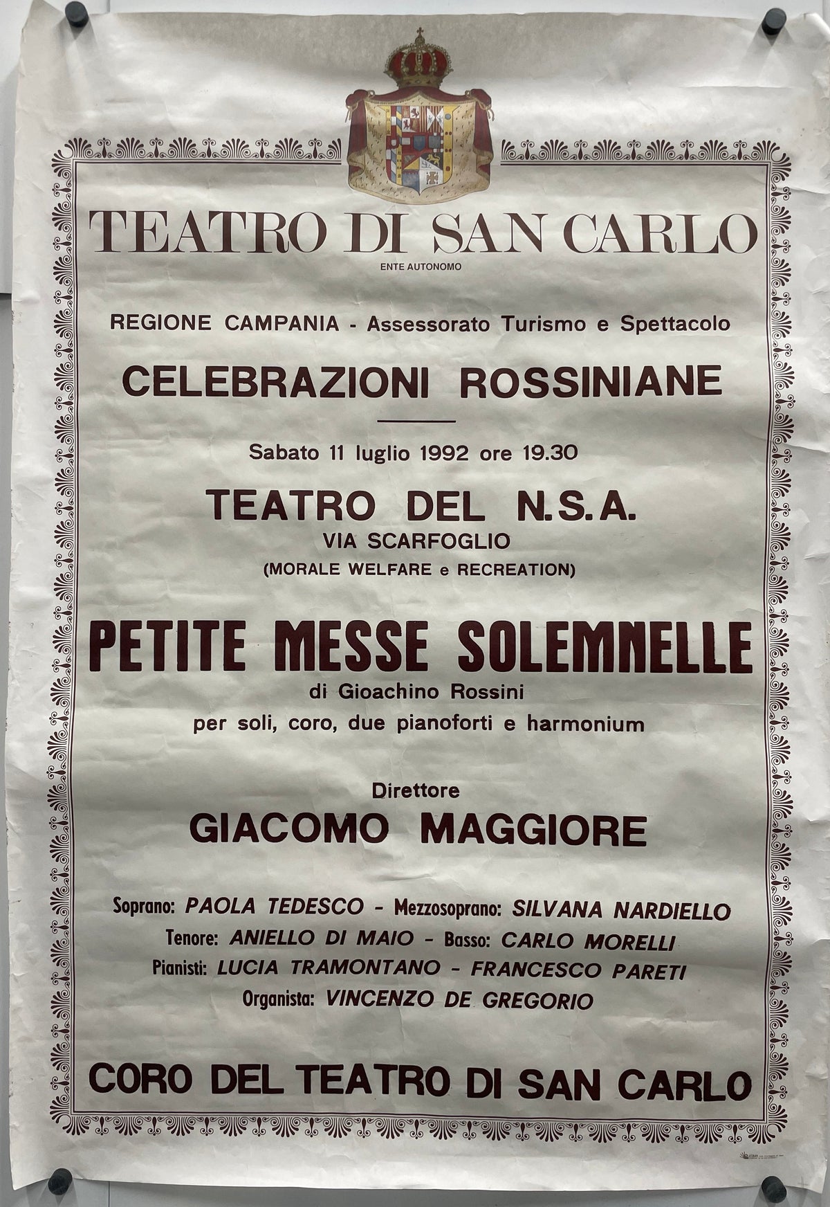 Vintage poster for a Rossini opera performance at Teatro San Carlo, featuring text and decorative elements.