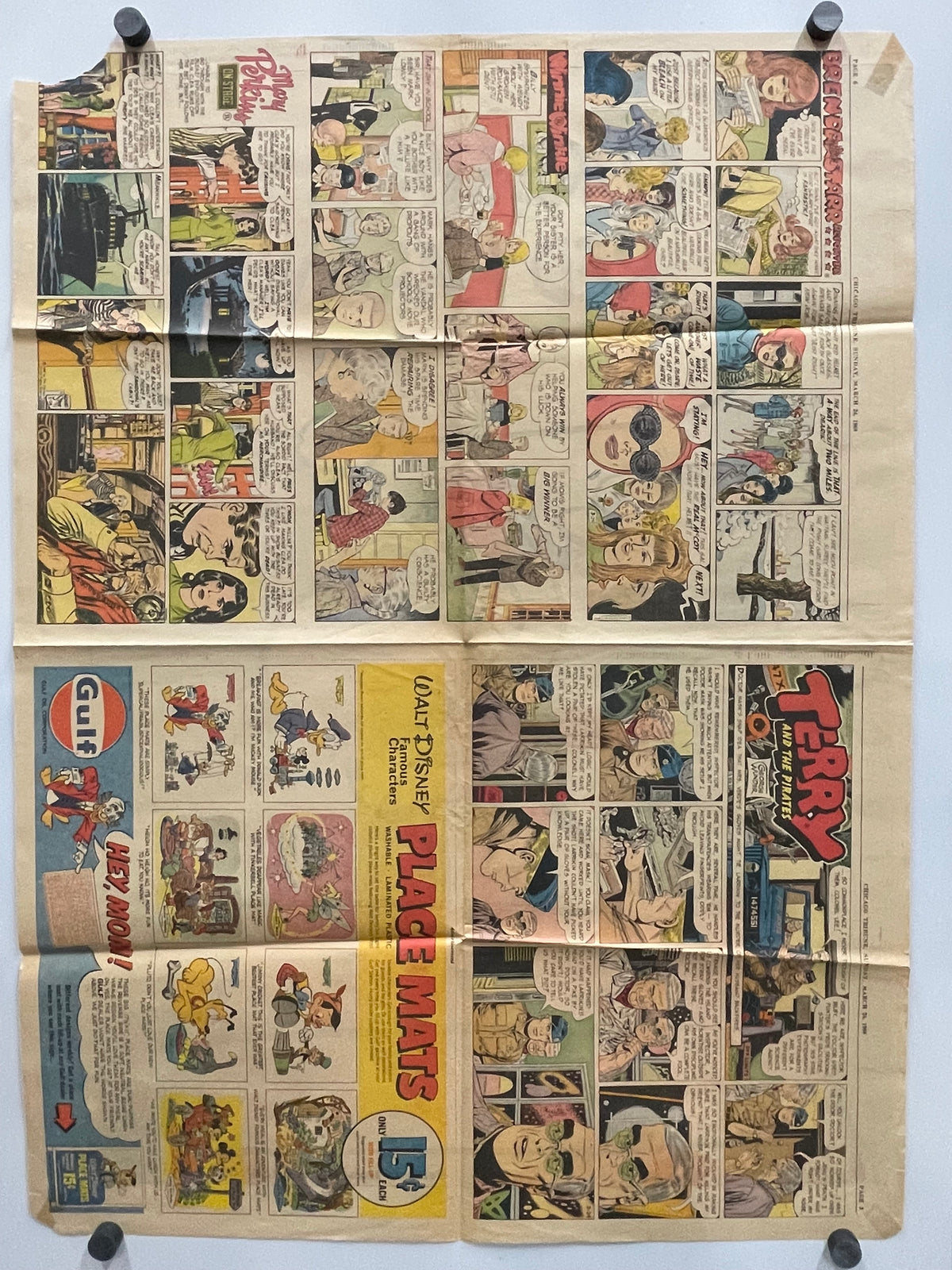Vintage comic strip page with advertisements on a white background