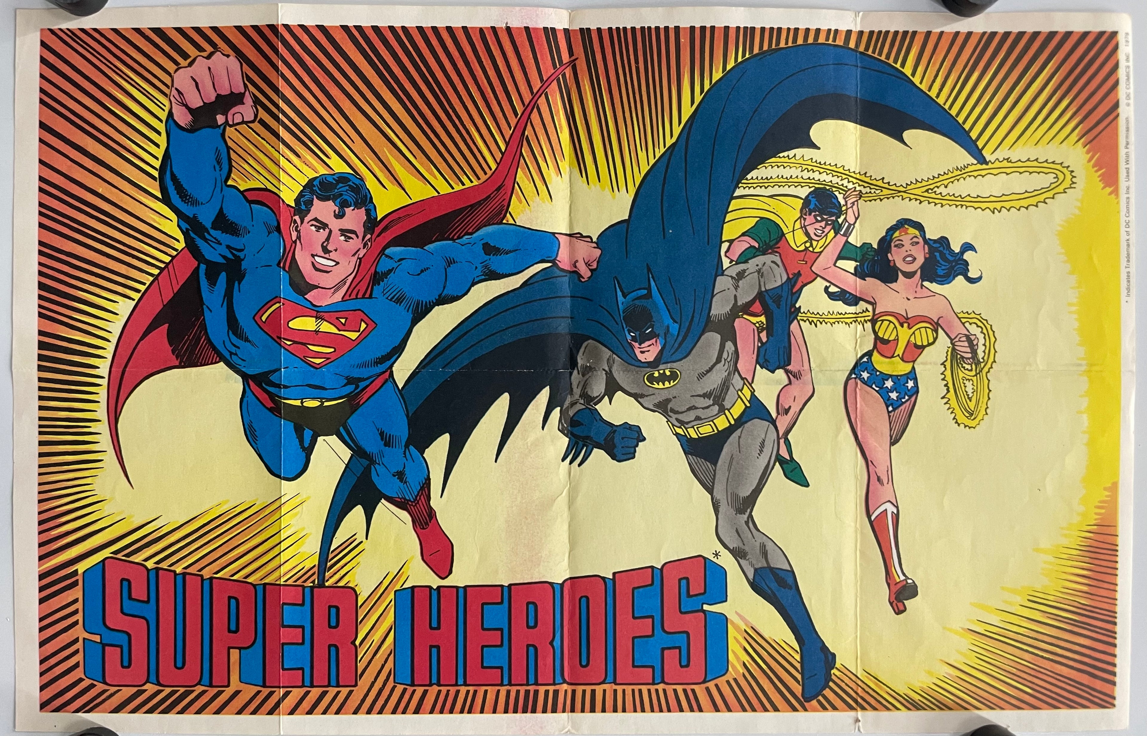 Vintage-style poster featuring Superman, Batman, and Wonder Woman with 'Super Heroes' text.