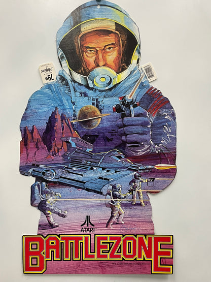 Cardboard cutout of an astronaut from the Atari Battlezone game, featuring the game's logo and title.