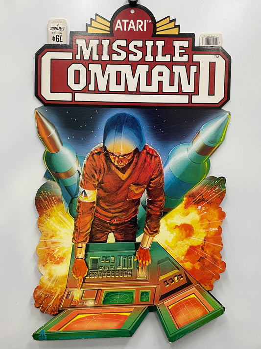 Vintage Atari Missile Command II game box with a character and rockets on a white background