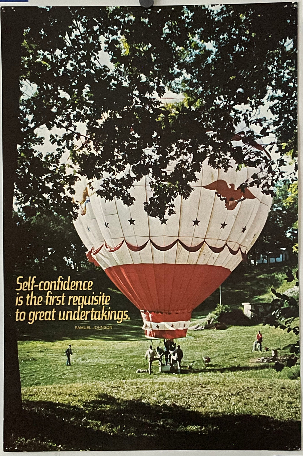 Vintage poster featuring a hot air balloon in a park with the text 'SELF-CONFIDENCE IS THE FIRST REQUISITE TO GREAT UNDERTAKINGS' and a quote by Samuel Johnson. The background shows a landscape with trees and people.