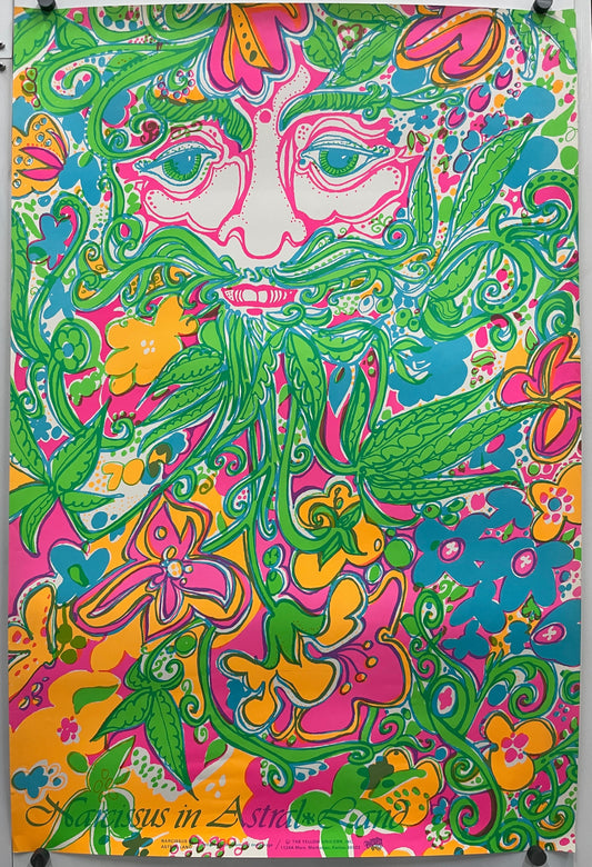 A rectangular panel featuring a vibrant, psychedelic floral and paisley pattern in pink, green, yellow, and blue, displayed flat with binder clips at the corners for a 1960s Narcissus in Astral Land.
