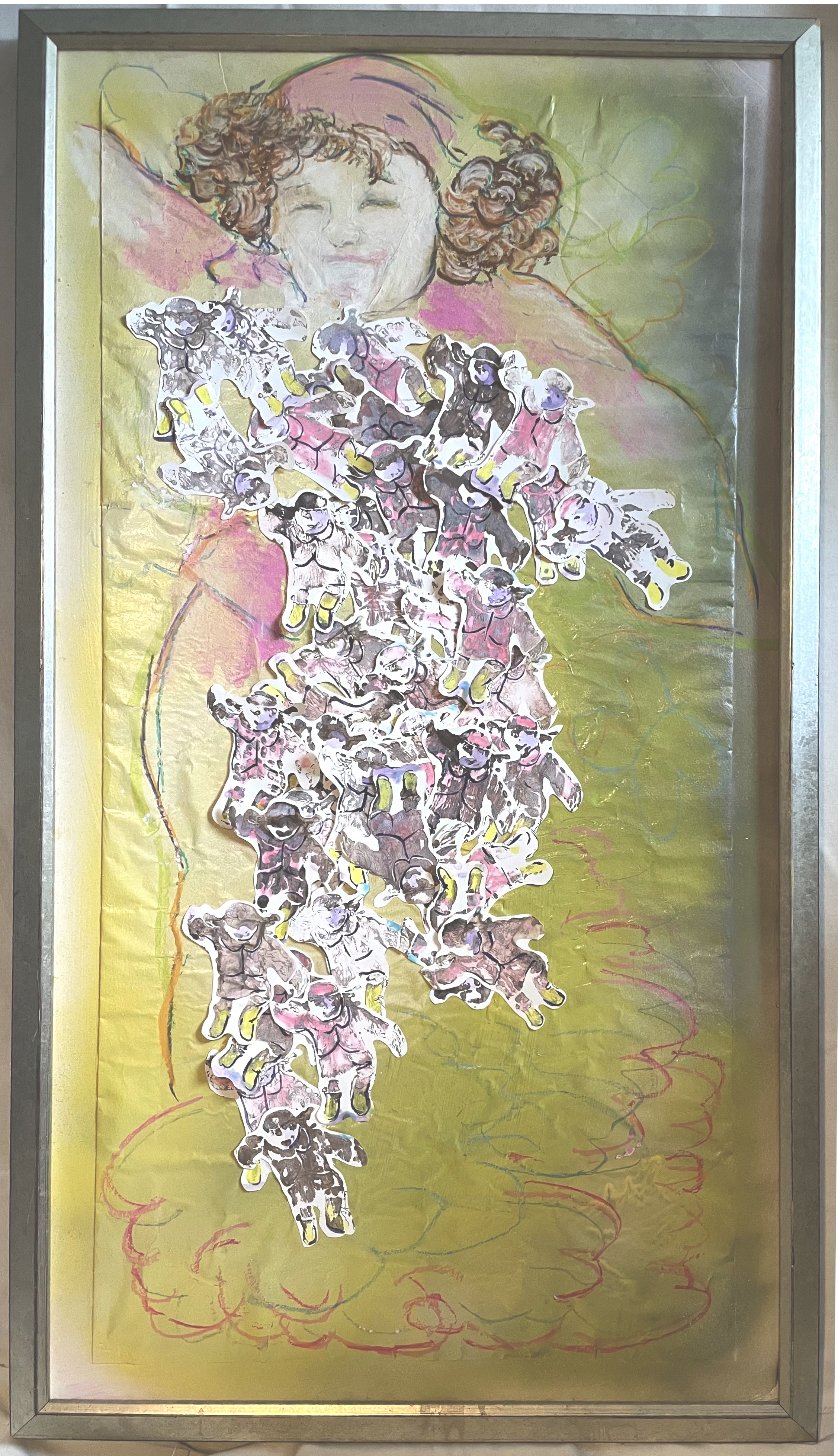 A framed mixed-media artwork depicting a child with curly brown hair, a pink hat and matching jacket, and a body made of many small cutout figures, set against a yellow-green background with pink linework. The piece is enclosed in a distressed silver wooden frame with a red accent line.