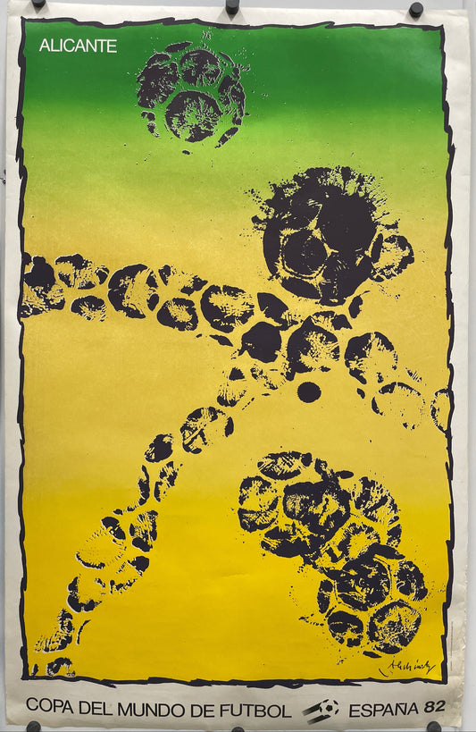 ALICANTE - Copa del Mundo de Futbol
vintage offset-lithographic sports poster, abstract design of a silhouette of a soccer player on a yellow and green background.