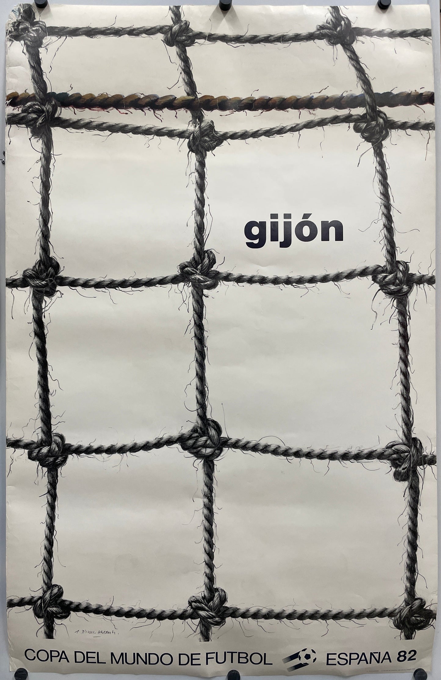 Gijón- Copa del Mundo de Futbol
vintage offset-lithographic sports poster, textured surface with grid pattern.